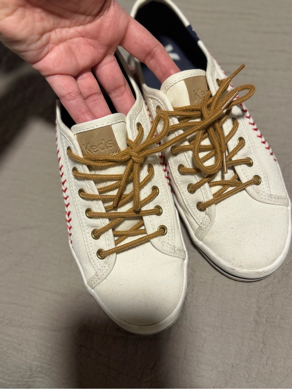 Keds Cream Canvas Sneakers with Brown Laces and Red Stitching